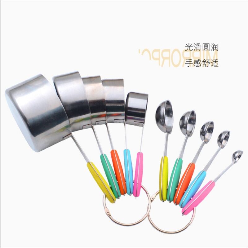 Stainless steel baking tools with measuring cups and spoons