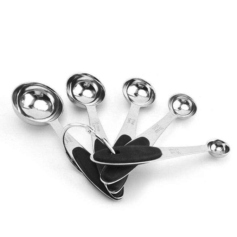 Stainless steel baking tools with measuring cups and spoons