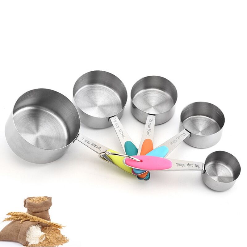 Stainless steel baking tools with measuring cups and spoons