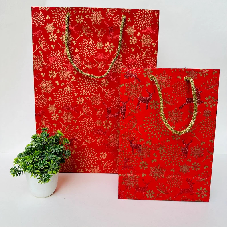 Handmade paper bags in Christmas Dear Print, Glitter Print Paper Bags, Christmas Gift Bags, Carry Bags, Gift Bags, Printed Paper in 250 GSM