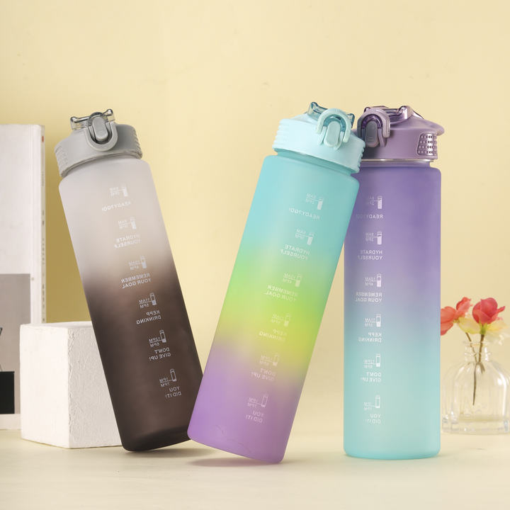 1000ml/32oz Bpa Free Eco Friendly Gradient Color 1liter Plastic Sport  Water Bottle with Silicone mouthpiece and portable handle Overseas Manufacturing Manufacturer