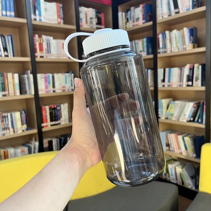 Delivery fast stock student plastic drinking bottle RTS 32oz/1000ml bpa free plastic Gym sport water bottle with handle ODM Manufacturing