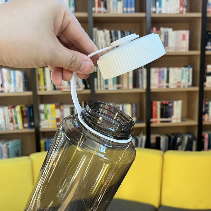Delivery fast stock student plastic drinking bottle RTS 32oz/1000ml bpa free plastic Gym sport water bottle with handle ODM Manufacturing