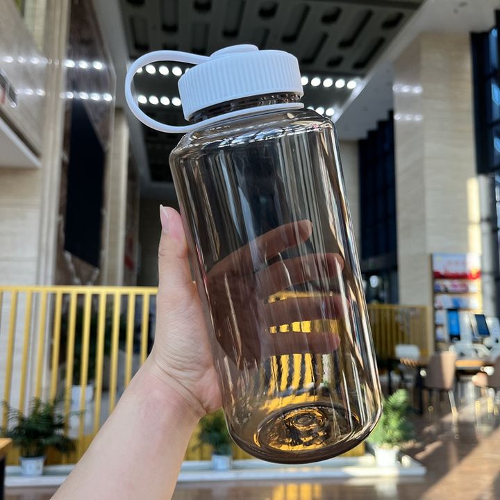 Delivery fast stock student plastic drinking bottle RTS 32oz/1000ml bpa free plastic Gym sport water bottle with handle ODM Manufacturing