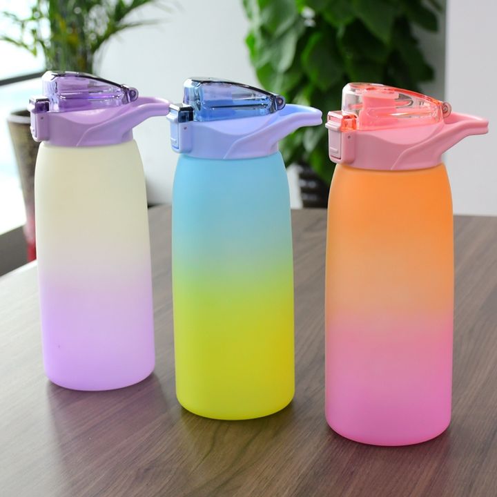 Eco friendly portable drinking bottle gradient direct drinking 1000ml sport plastic water bottle with Bounce dust lid and handle Industrial Exporter Operations