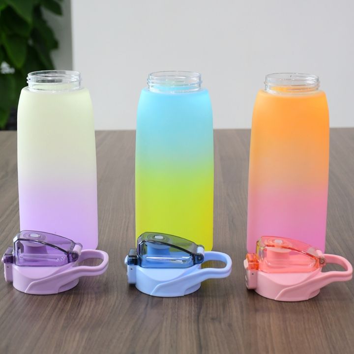 Eco friendly portable drinking bottle gradient direct drinking 1000ml sport plastic water bottle with Bounce dust lid and handle Industrial Exporter Operations