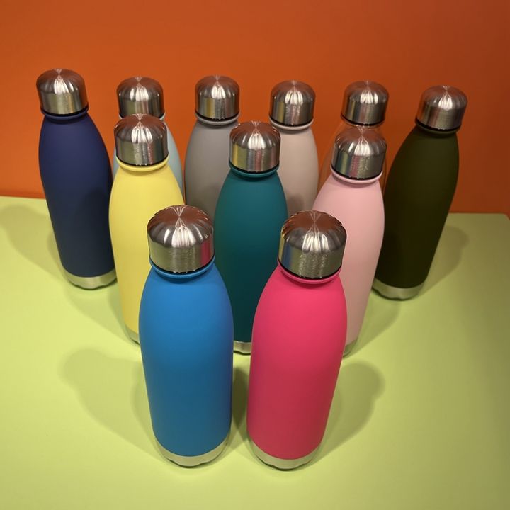 In stock BPA free Competitive Price Eco-friendly  680ml plastic cola shape water bottle with sports metal lid and bottom