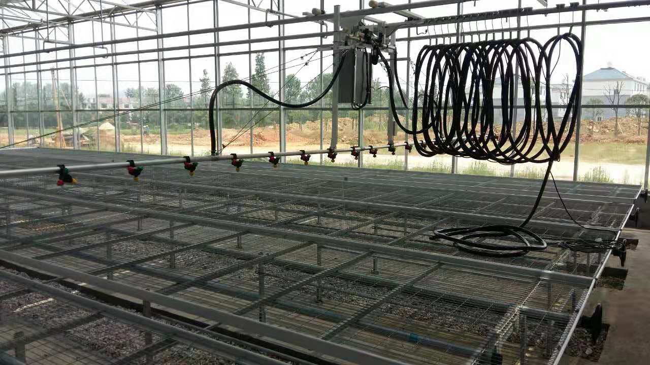 Agricultural Greenhouse Hot-Sale High Sprinkler Boom Automatic Mobile Sprinkler Machine Irrigation system