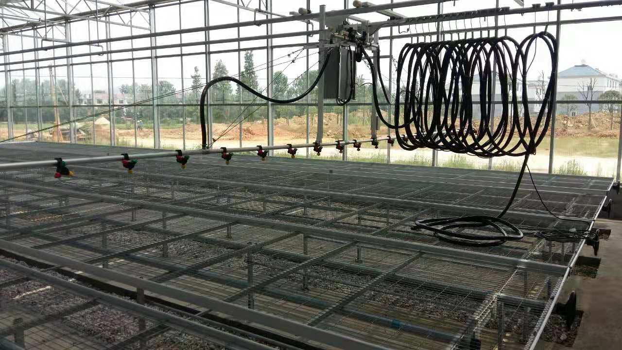 Agricultural Greenhouse Hot-Sale High Sprinkler Boom Automatic Mobile Sprinkler Machine Irrigation system China Bulk Supplier